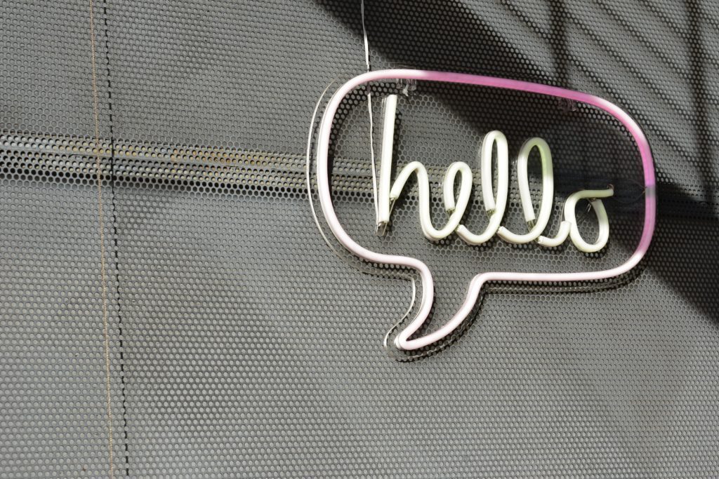 Hello Sign on Metal Background