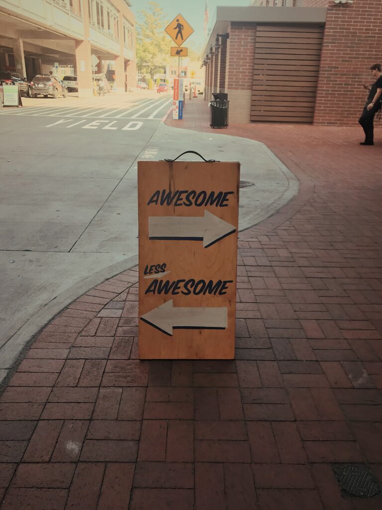 awesome sign on wood on the street