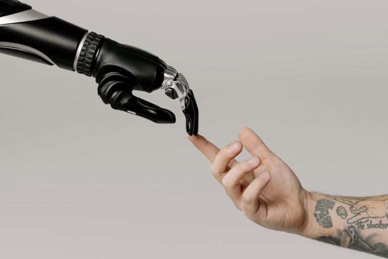 Robot Hand touching a human hand